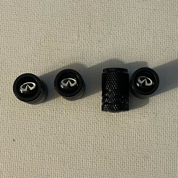 Infinity valve Stem caps in black set of 4 NWT - Picture 1 of 4